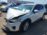 ✅ 2015 Mazda CX-5 Grand Touring • VIN: JM3KE2DY3F0487068 • Lot: 42702113. Wystawiony na IAAI z przebiegiem 110 989 mil. Bezpłatny archiwum sprzedaży aukcyjnych z USA i szczegółowy raport historii pojazdu na DreamBid. Zdjęcie 2.