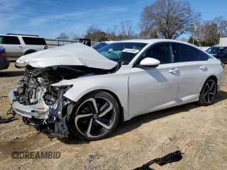 2018 Honda Accord Sport z VIN 1HGCV2E33JA001332, wystawiony jako Copart lot #44244585 z przebiegiem 105 169 mil mil oraz Szkoda całkowita • Salvage title. Historia ofert i sprzedaży dostępna na DreamBid. Obrazek 1.