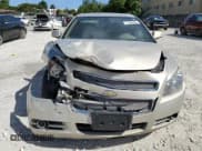 ✅ 2012 Chevrolet Malibu LTZ 1LZ • VIN: 1G1ZE5E0XCF343309 • Lot: 77542004. Listed on Copart with 152,319 mi. Free auction sales archive from the USA and detailed vehicle history report at DreamBid. Image 5.