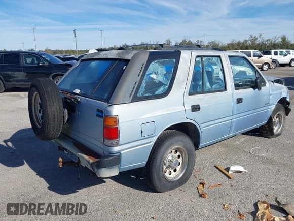✅ 1992 Isuzu Rodeo • VIN: 4S2CG58Z4N4325991 • Lot: 11290902. Listed on IAAI with 208,660 mi. Free auction sales archive from the USA and detailed vehicle history report at DreamBid. Image 4.