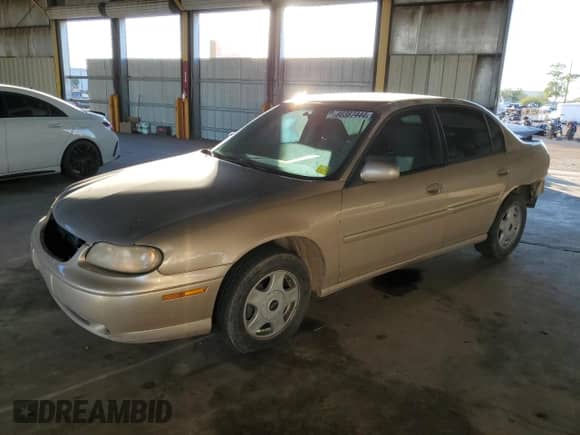 2001 Chevrolet Malibu LS with VIN 1G1NE52J716270277, listed as a Copart auction lot 80387444 with 185,084 mi miles and Salvage title. Bid and sale history available at DreamBid. Image 1.