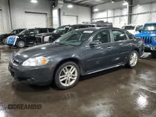 ✅ 2014 Chevrolet Impala LTZ • VIN: 2G1WC5E36E1156579 • Lot: 91980555. Listed on Copart with 149,625 mi. Free auction sales archive from the USA and detailed vehicle history report at DreamBid. Image 1.