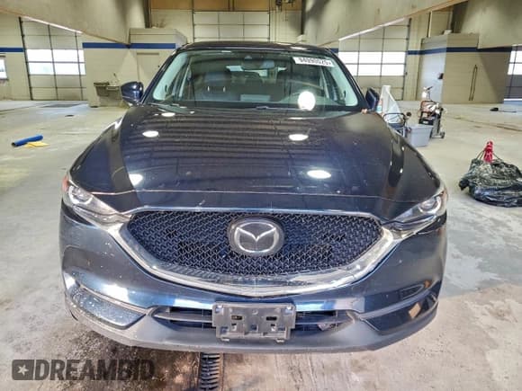 ✅ 2018 Mazda CX-5 Touring • VIN: JM3KFBCM0J0426491 • Lot: 94990025. Wystawiony na Copart z przebiegiem 74 844 mil. Bezpłatny archiwum sprzedaży aukcyjnych z USA i szczegółowy raport historii pojazdu na DreamBid. Zdjęcie 5.