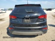 ✅ 2018 Hyundai Santa Fe 2.4L • VIN: 5XYZT3LB8JG529009 • Lot: 87020755. Listed on Copart with 127,659 mi. Free auction sales archive from the USA and detailed vehicle history report at DreamBid. Image 6.