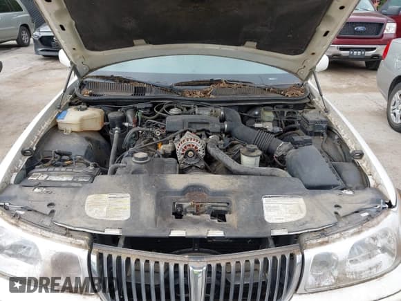 ✅ 1998 Lincoln Town Car Signature • VIN: 1LNFM82W5WY678263 • Lot: 42884109. Listed on IAAI with 128,024 mi. Free auction sales archive from the USA and detailed vehicle history report at DreamBid. Image 10.