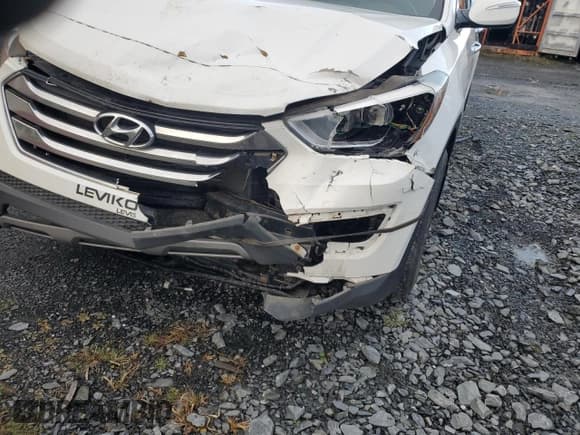 ✅ 2014 Hyundai Santa Fe • VIN: 5XYZUDLB8EG159107 • Lot: 89474465. Listed on Copart with 135,472 mi. Free auction sales archive from the USA and detailed vehicle history report at DreamBid. Image 13.