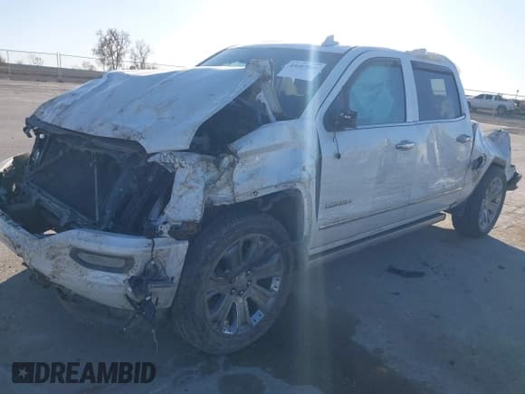 ✅ 2017 GMC Sierra 1500 Denali • VIN: 3GTU2PEJ0HG231719 • Lot: 43607868. Listed on IAAI with 144,707 mi. Free auction sales archive from the USA and detailed vehicle history report at DreamBid. Image 2.