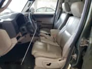 ✅ 2006 Jeep Commander Limited • VIN: 1J8HG58N86C303152 • Lot: 80572665. Wystawiony na Copart z przebiegiem 215 357 mil. Bezpłatny archiwum sprzedaży aukcyjnych z USA i szczegółowy raport historii pojazdu na DreamBid. Zdjęcie 7.