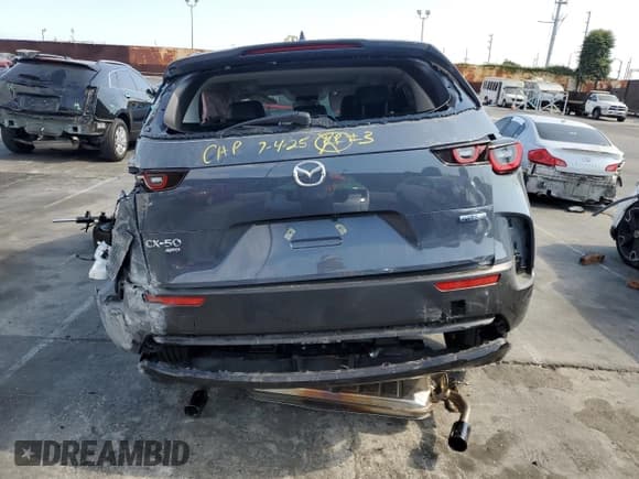 ✅ 2025 Mazda CX-50 Hybrid Premium Package • VIN: 7MMVAADWXSN120093 • Lot: 65423715. Wystawiony na Copart z przebiegiem 4 829 mil. Bezpłatny archiwum sprzedaży aukcyjnych z USA i szczegółowy raport historii pojazdu na DreamBid. Zdjęcie 6.