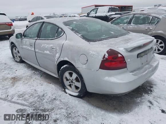 ✅ 2005 Pontiac Grand Prix • VIN: 2G2WP522651188928 • Lot: 43814437. Listed on IAAI with 254,648 mi. Free auction sales archive from the USA and detailed vehicle history report at DreamBid. Image 3.