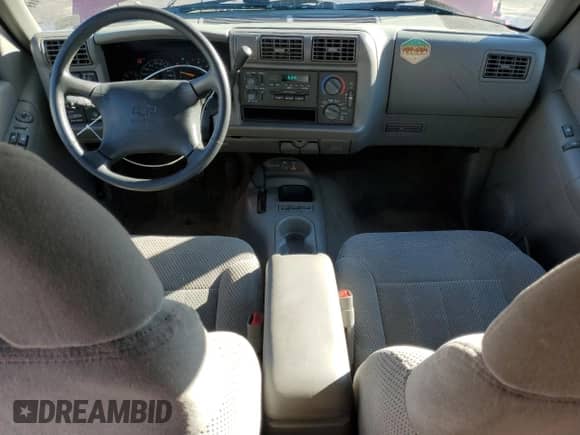 1995 Chevrolet Blazer z VIN 1GNDT13W0S2245670, wystawiony jako Copart lot #79855374 z przebiegiem 144 220 mil mil oraz Szkoda całkowita • Salvage title. Historia ofert i sprzedaży dostępna na DreamBid. Obrazek 8.