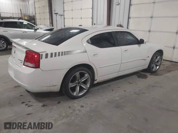 2010 Dodge Charger SXT z VIN 2B3CA3CV9AH116962, wystawiony jako IAAI lot #43141447 z przebiegiem 120 000 mil mil oraz . Historia ofert i sprzedaży dostępna na DreamBid. Obrazek 4.