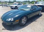 ✅ 1998 Jaguar XK • VIN: SAJGX2240WC027066 • Lot: 42754641. Listed on IAAI with 111,533 mi. Free auction sales archive from the USA and detailed vehicle history report at DreamBid. Image 2.