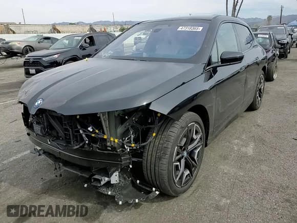 ✅ 2025 BMW iX xDrive50 • VIN: WB523CF06SCT06612 • Lot: 47318365. Listed on Copart with 2,297 mi. Free auction sales archive from the USA and detailed vehicle history report at DreamBid. Image 12.