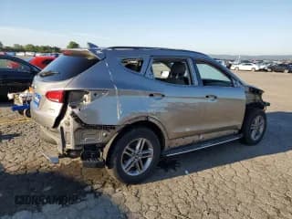 ✅ 2018 Hyundai Santa Fe 2.4L • VIN: 5NMZUDLB8JH067060 • Лот: 62051424. Опубликован ранее на Copart с пробегом 59 910 миль. Бесплатный доступ к архиву аукционных продаж из США и подробный отчёт об истории автомобиля на DreamBid. Изображение 3.
