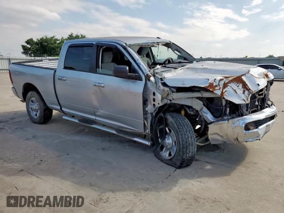 ✅ 2014 Ram 2500 SLT • VIN: 3C6TR5DT2EG205852 • Lot: 59514745. Listed on Copart with 130,510 mi. Free auction sales archive from the USA and detailed vehicle history report at DreamBid. Image 4.