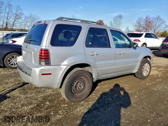 ✅ 2005 Mercury Mariner Luxury • VIN: 4M2YU571X5DJ03407 • Лот: 94408395. Опубликован ранее на Copart с пробегом 187 352 миль. Бесплатный доступ к архиву аукционных продаж из США и подробный отчёт об истории автомобиля на DreamBid. Изображение 3.