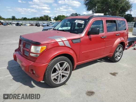 2011 Dodge Nitro Shock z VIN 1D4PT7GX1BW559691, wystawiony jako Copart lot #89531495 z przebiegiem 91 241 mil mil oraz Nie do naprawy • Non repairable. Historia ofert i sprzedaży dostępna na DreamBid. Obrazek 1.
