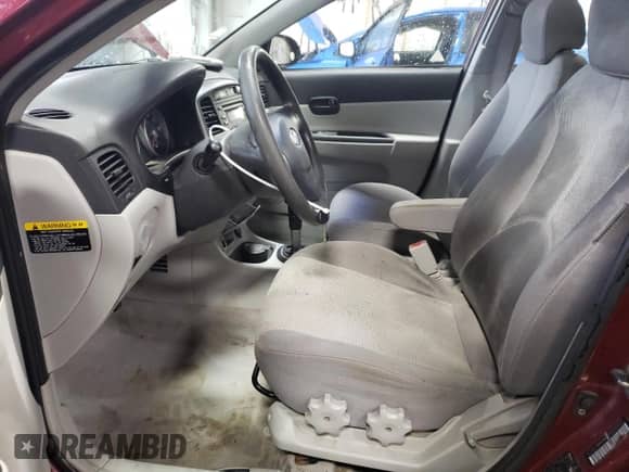 2007 Hyundai Accent GLS z VIN KMHCN46C07U117177, wystawiony jako Copart lot #80696604 z przebiegiem 161 962 mil mil oraz Szkoda całkowita • Salvage title. Historia ofert i sprzedaży dostępna na DreamBid. Obrazek 7.