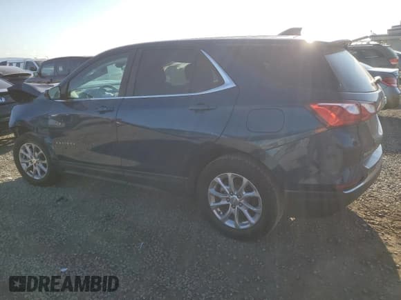 ✅ 2021 Chevrolet Equinox LT • VIN: 2GNAXTEV0M6138843 • Lot: 80565175. Listed on Copart with 82,470 mi. Free auction sales archive from the USA and detailed vehicle history report at DreamBid. Image 2.