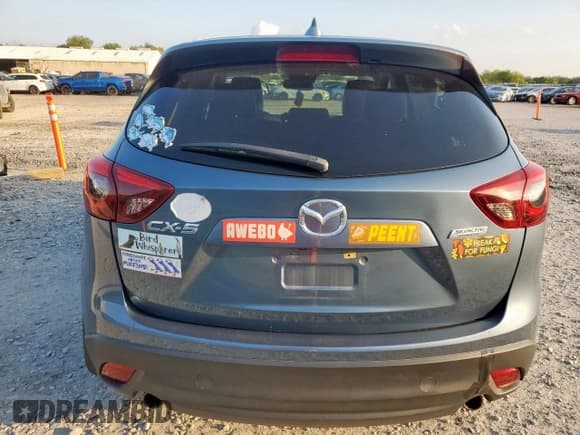 ✅ 2016 Mazda CX-5 Grand Touring • VIN: JM3KE2DY3G0703048 • Lot: 85378725. Wystawiony na Copart z przebiegiem 28 667 mil. Bezpłatny archiwum sprzedaży aukcyjnych z USA i szczegółowy raport historii pojazdu na DreamBid. Zdjęcie 6.