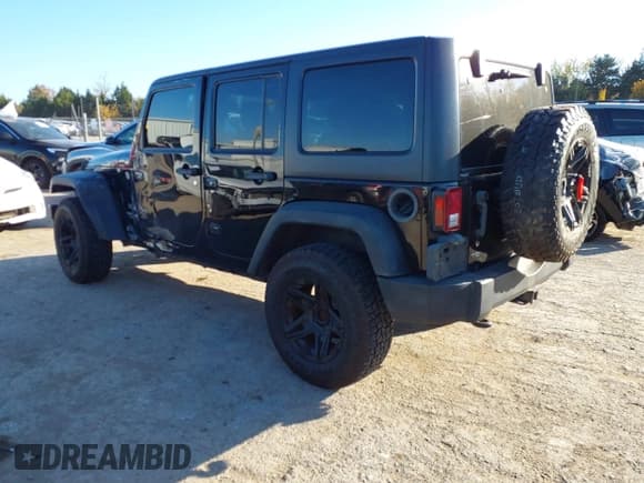 ✅ 2012 Jeep Wrangler Unlimited Sport • VIN: 1C4BJWDG7CL220237 • Lot: 43602318. Listed on IAAI with 136,810 mi. Free auction sales archive from the USA and detailed vehicle history report at DreamBid. Image 3.