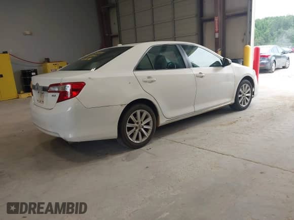 2013 Toyota Camry L with VIN 4T4BF1FK9DR293452, listed as a IAAI auction lot 42876325 with 225,034 mi miles and . Bid and sale history available at DreamBid. Image 4.