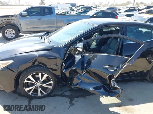 ✅ 2016 Nissan Maxima SR • VIN: 1N4AA6APXGC380558 • Лот: 42966389. Опубликован ранее на IAAI с пробегом 137 310 миль. Бесплатный доступ к архиву аукционных продаж из США и подробный отчёт об истории автомобиля на DreamBid. Изображение 6.