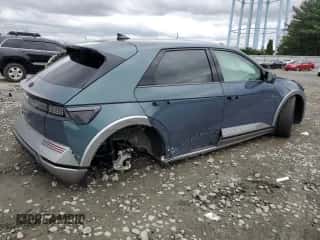 2023 Hyundai Ioniq 5 Limited z VIN KM8KRDAFXPU156022, wystawiony jako Copart lot #69084844 z przebiegiem 31 480 mil mil oraz Szkoda całkowita • Salvage title. Historia ofert i sprzedaży dostępna na DreamBid. Obrazek 3.