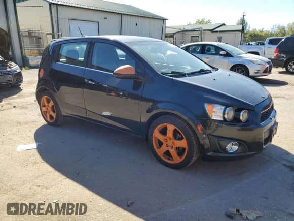 2015 Chevrolet Sonic LTZ с VIN 1G1JE6SB7F4120220, выставлен на аукционе Copart как лот 73006014 с пробегом 176 394 миль миль и Списание • Salvage title. История ставок и продаж доступна на DreamBid. Изображение 4.