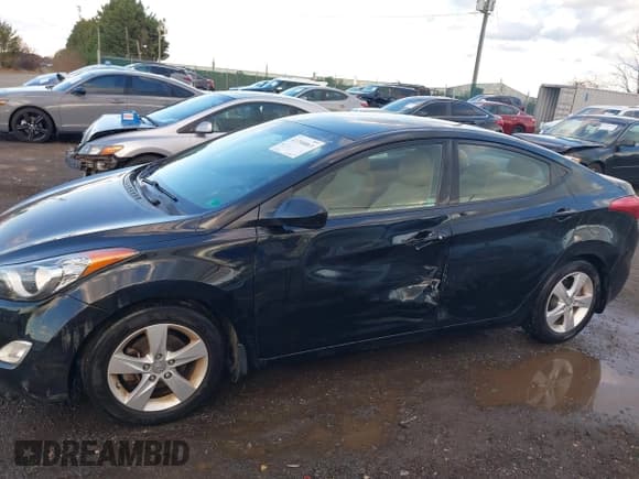 ✅ 2013 Hyundai Elantra GLS • VIN: 5NPDH4AE1DH385220 • Lot: 43788863. Listed on IAAI with 107,161 mi. Free auction sales archive from the USA and detailed vehicle history report at DreamBid. Image 14.