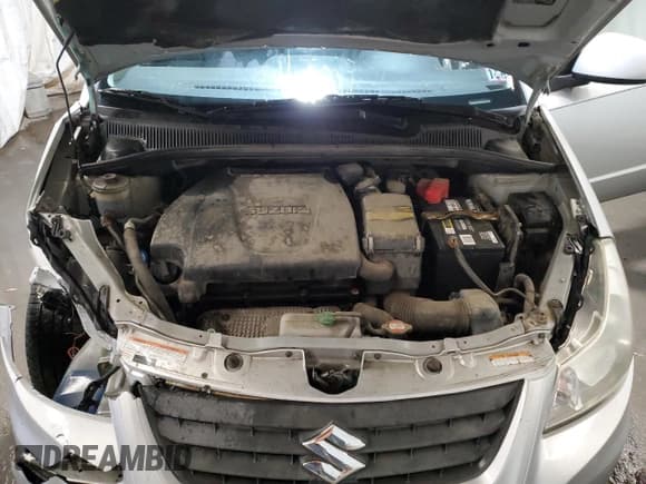 ✅ 2013 Suzuki SX4 Crossover • VIN: JS2YB5A31D6102256 • Лот: 91778295. Опубликован ранее на Copart с пробегом 209 702 миль. Бесплатный доступ к архиву аукционных продаж из США и подробный отчёт об истории автомобиля на DreamBid. Изображение 12.