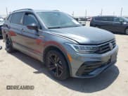 ✅ 2023 Volkswagen Tiguan SE R-Line Black • VIN: 3VVCB7AX7PM002428 • Лот: 42510090. Опубликован ранее на IAAI с пробегом 31 362 миль. Бесплатный доступ к архиву аукционных продаж из США и подробный отчёт об истории автомобиля на DreamBid. Изображение 1.
