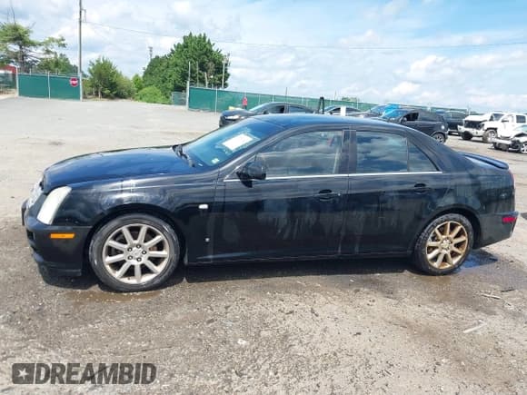✅ 2007 Cadillac STS • VIN: 1G6DW677470118331 • Lot: 42771383. Wystawiony na IAAI z przebiegiem 125 182 mil. Bezpłatny archiwum sprzedaży aukcyjnych z USA i szczegółowy raport historii pojazdu na DreamBid. Zdjęcie 14.
