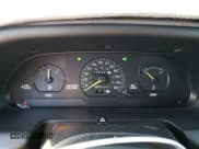 ✅ 1995 Ford Escort LX • VIN: 3FASP13J0SR159107 • Lot: 76715394. Listed on Copart with 353,430 mi. Free auction sales archive from the USA and detailed vehicle history report at DreamBid. Image 9.