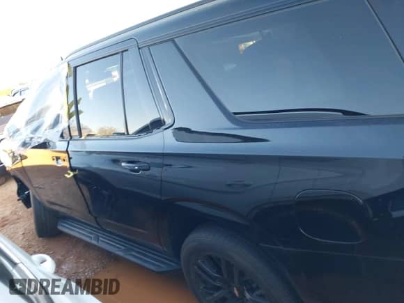 2023 Chevrolet Tahoe RST z VIN 1GNSKRKD7PR400349, wystawiony jako IAAI lot #41331940 z przebiegiem 25 503 mil mil oraz . Historia ofert i sprzedaży dostępna na DreamBid. Obrazek 14.