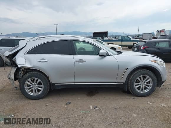 ✅ 2009 Infiniti FX • VIN: JNRAS18W69M151556 • Lot: 43155740. Wystawiony na IAAI z przebiegiem 215 523 mil. Bezpłatny archiwum sprzedaży aukcyjnych z USA i szczegółowy raport historii pojazdu na DreamBid. Zdjęcie 14.
