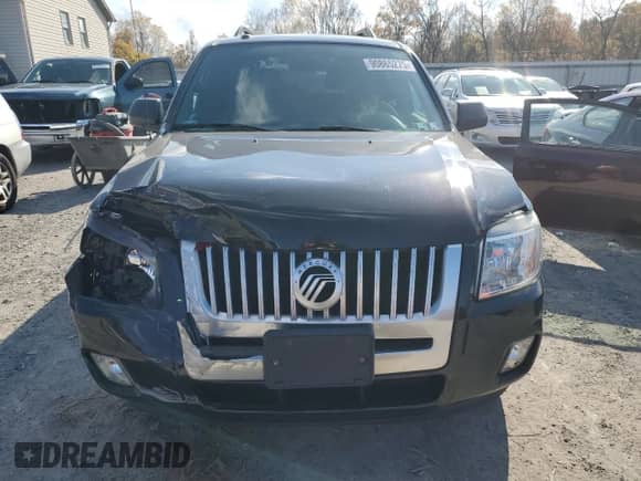 2011 Mercury Mariner с VIN 4M2CN8B78BKJ03563, выставлен на аукционе Copart как лот 90865275 с пробегом 84 082 миль миль и Списание • Salvage title. История ставок и продаж доступна на DreamBid. Изображение 5.
