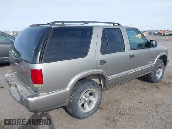 2004 Chevrolet Blazer Fleet z VIN 1GNCS13X54K143744, wystawiony jako IAAI lot #41904015 z przebiegiem Nie podano mil oraz . Historia ofert i sprzedaży dostępna na DreamBid. Obrazek 4.