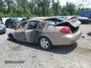 ✅ 2002 Ford Taurus SEL Deluxe • VIN: 1FAHP56S92A116336 • Lot: 64749165. Listed on Copart with Not provided. Free auction sales archive from the USA and detailed vehicle history report at DreamBid. Image 2.