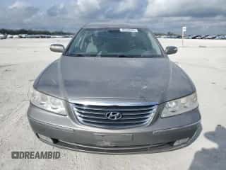 2009 Hyundai Azera Limited с VIN KMHFC46FX9A373084, выставлен на аукционе Copart как лот 45532865 с пробегом 107 592 миль миль и Списание • Salvage title. История ставок и продаж доступна на DreamBid. Изображение 5.