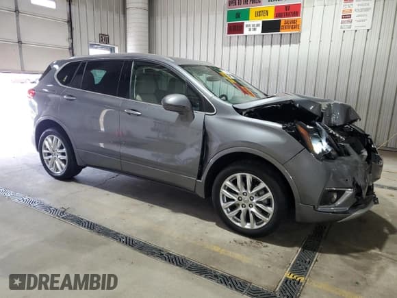 ✅ 2020 Buick Envision Premium • VIN: LRBFX3SX0LD137999 • Лот: 70746225. Опубликован ранее на Copart с пробегом 56 953 миль. Бесплатный доступ к архиву аукционных продаж из США и подробный отчёт об истории автомобиля на DreamBid. Изображение 4.