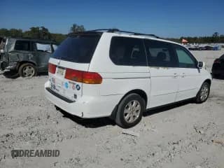 ✅ 2004 Honda Odyssey EX-L • VIN: 5FNRL18024B009069 • Lot: 82582475. Wystawiony na Copart z przebiegiem 162 929 mil. Bezpłatny archiwum sprzedaży aukcyjnych z USA i szczegółowy raport historii pojazdu na DreamBid. Zdjęcie 3.