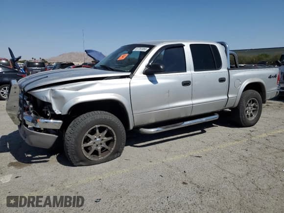 ✅ 2004 Dodge Dakota SLT • VIN: 1D7HG48N74S509797 • Lot: 57797055. Wystawiony na Copart z przebiegiem 214 275 mil. Bezpłatny archiwum sprzedaży aukcyjnych z USA i szczegółowy raport historii pojazdu na DreamBid. Zdjęcie 1.