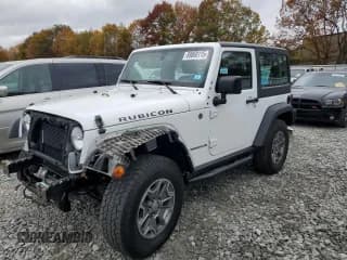 ✅ 2015 Jeep Wrangler Rubicon Hard Rock • VIN: 1C4BJWCG8FL713138 • Лот: 89868115. Опубликован ранее на Copart с пробегом 83 894 миль. Бесплатный доступ к архиву аукционных продаж из США и подробный отчёт об истории автомобиля на DreamBid. Изображение 1.