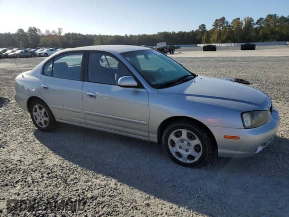 2001 Hyundai Elantra GLS with VIN KMHDN45D81U161742, listed as a Copart auction lot 79253234 with 107,321 mi miles and Non repairable. Bid and sale history available at DreamBid. Image 4.