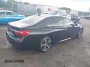 ✅ 2017 BMW 7 Series 740i • VIN: WBA7E2C38HG741062 • Лот: 42629220. Опубликован ранее на IAAI с пробегом 101 784 миль. Бесплатный доступ к архиву аукционных продаж из США и подробный отчёт об истории автомобиля на DreamBid. Изображение 4.