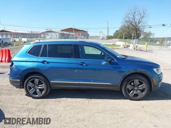 ✅ 2020 Volkswagen Tiguan SE • VIN: 3VV2B7AX0LM125607 • Lot: 43506953. Listed on IAAI with 80,746 mi. Free auction sales archive from the USA and detailed vehicle history report at DreamBid. Image 13.