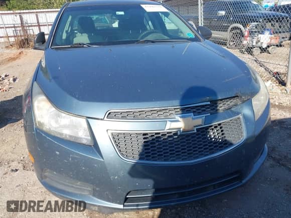 2012 Chevrolet Cruze LS z VIN 1G1PC5SH4C7299339, wystawiony jako IAAI lot #43442779 z przebiegiem 197 467 mil mil oraz . Historia ofert i sprzedaży dostępna na DreamBid. Obrazek 6.