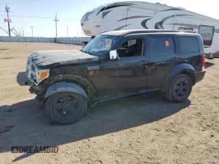 2008 Dodge Nitro SXT с VIN 1D8GU28K58W219907, выставлен на аукционе Copart как лот 77009104 с пробегом Не указан миль и Списание • Salvage title. История ставок и продаж доступна на DreamBid. Изображение 1.